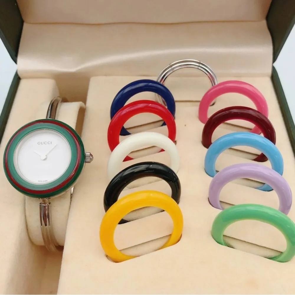 Gucci Silver Bracelet Watch with all bezels shown